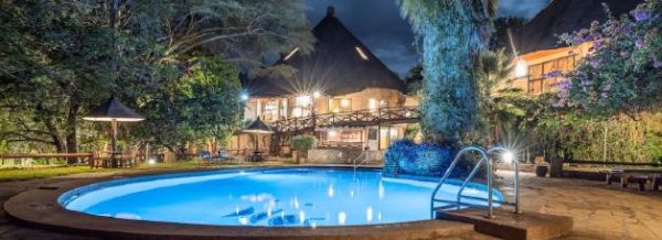 Swimming pool at Sopa Lodge with scenic views on a Cruzeiro Safaris Kenya tour