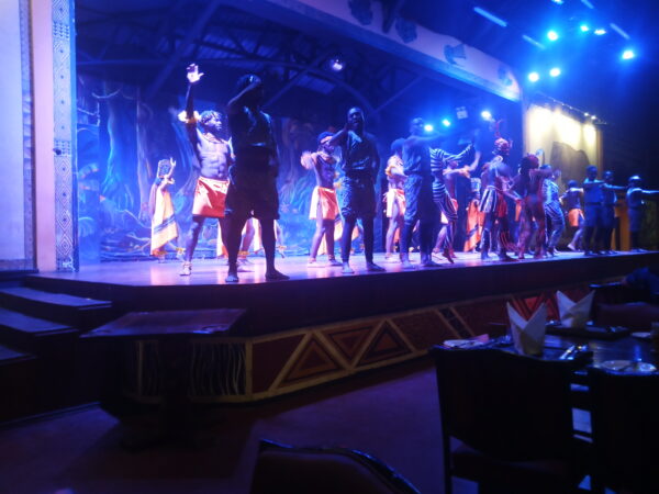 Performers entertaining guests during the Safari Cat Show in Nairobi, part of the dinner and cultural experience tour with Cruzeiro Safaris Kenya.
