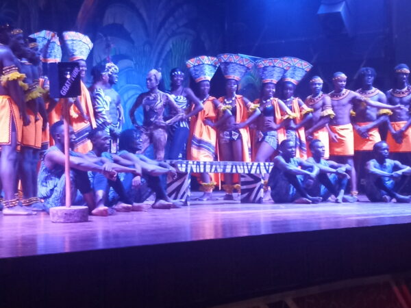 Traditional African dancers performing live at the Safari Cat Show in Nairobi during an evening tour with Cruzeiro Safaris.