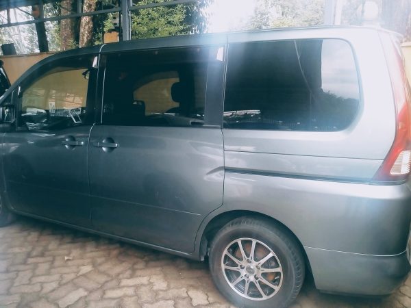 Transfer vehicles for Nairobi airport to hotels and city excursions, including trips to Giraffe Center, Elephant Orphanage, Karen Blixen Museum, Carnivore Restaurant, and family-friendly tours by Cruzeiro Safaris Kenya