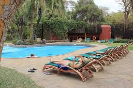 Swimming pool at Amboseli Serena Safari Lodge overlooking the open plains of Amboseli National Park.