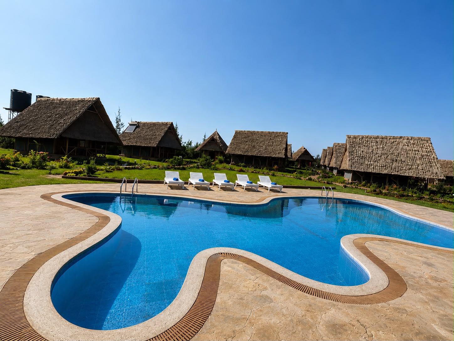 Swimming pool at Ambo Kili Cottages near Amboseli National Park, offering a relaxing oasis for guests staying on safari with Cruzeiro Safaris Kenya.